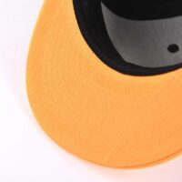 Aung-Crown-black-strapback-hat-with-a-orange-flat-brim-at-the-lower-brim-view-ACNA2011129