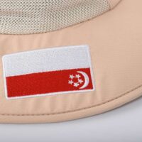 Aung-Crown-khaki-bucket-hat-safari-with-the-national-flag-on-the-brim-KN2101284