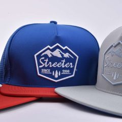 Streeter-unisex-trendy-trucker-hat-with-a-3D-embroidery-and-flat-mebroidery-logo-on-the-front-KN2103125