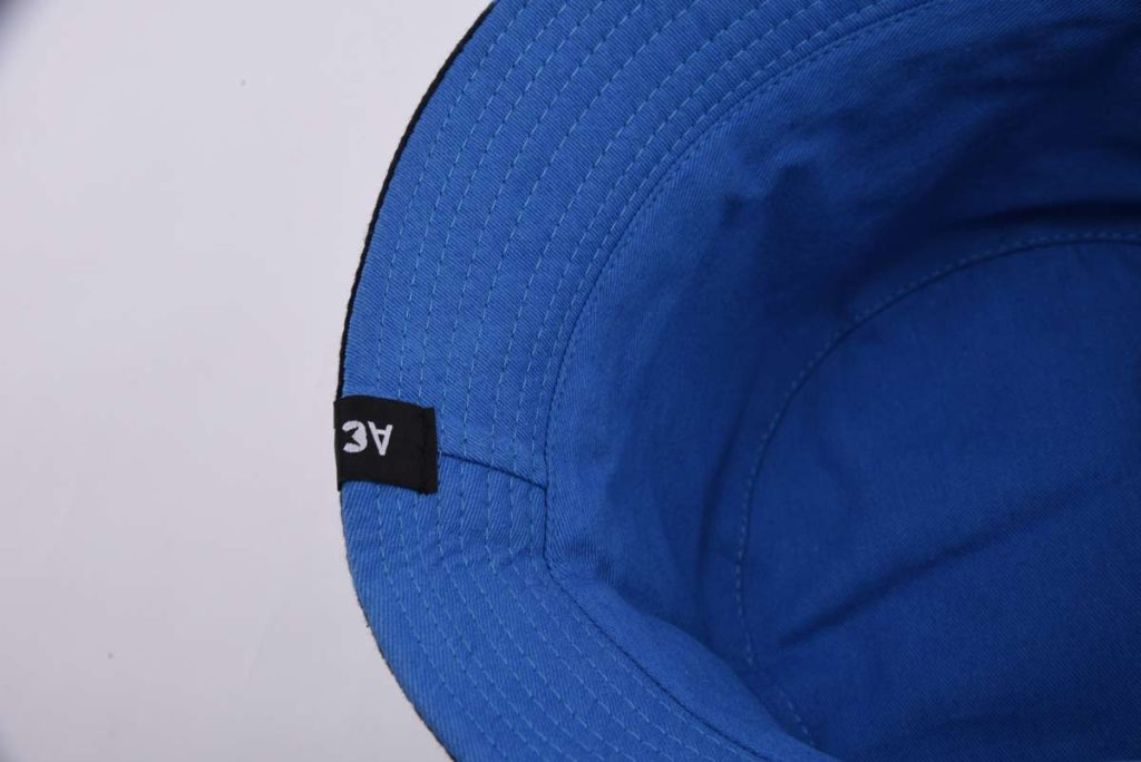 reversible knit bucket hat with a woven label SFG-210512-1