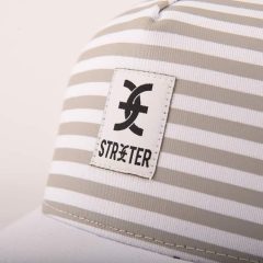 the-woven-label-on-the-striped-baseball-cap-SFG-210322-6